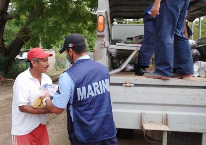 Hurricane Agatha victim in Oaxaca receiving aid