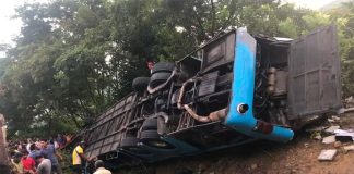 The bus that was carrying pilgrims from a visit to Tila.
