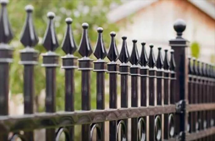 A spiked iron fence