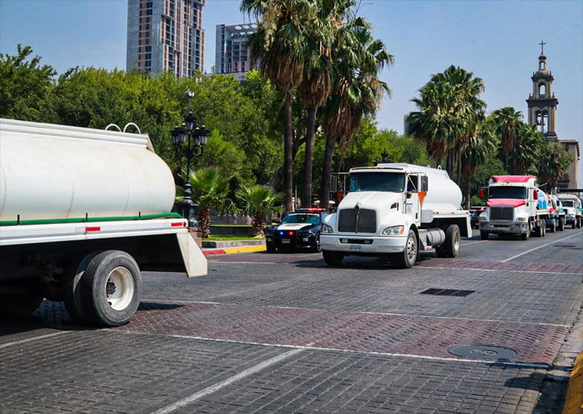 Water delivery trucks in Monterrey.