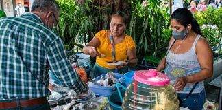 Festival organizers and guests serve up ant-centric local specialties.