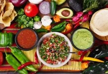 Several traditional salsas with their ingredients.