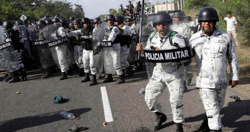 Mexico's military police confronting migrants in Tapachula