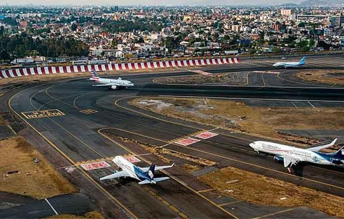 airplanes on runway at Mexico City International Airport
