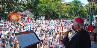 Archbishop Castro speaks to participants in Sunday's peace walk.