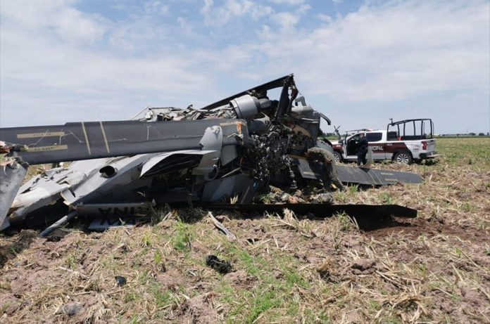 The helicopter crashed near the Los Mochis International Airport in northern Sinaloa.