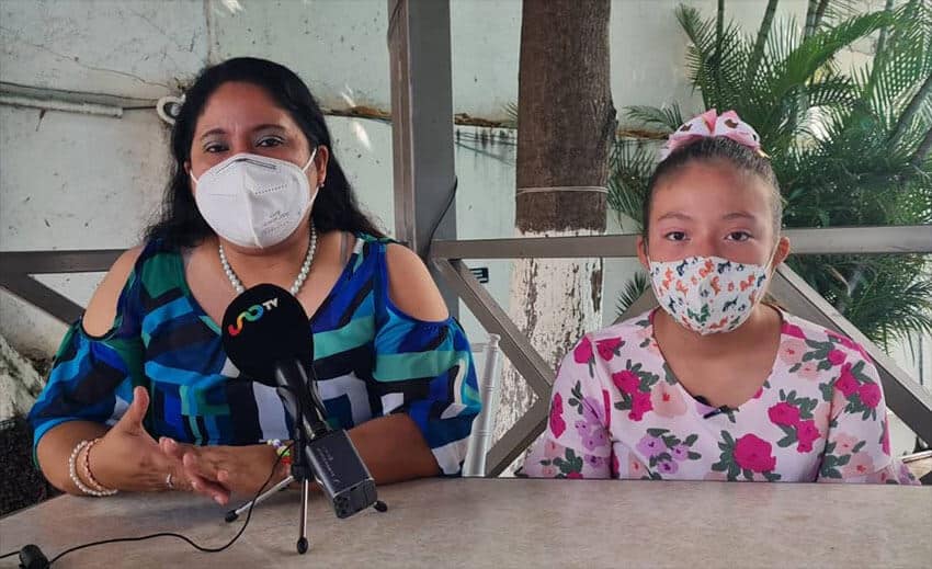 Michelle with her mother, a medical doctor.