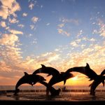 dolphins sculpture on the Malecón in Mazatlán.