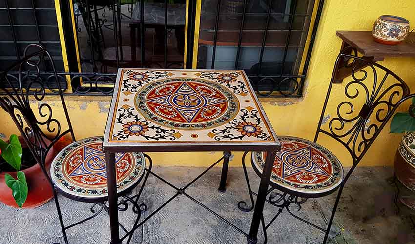 Ceramic table and chairs by Armando Barrera.