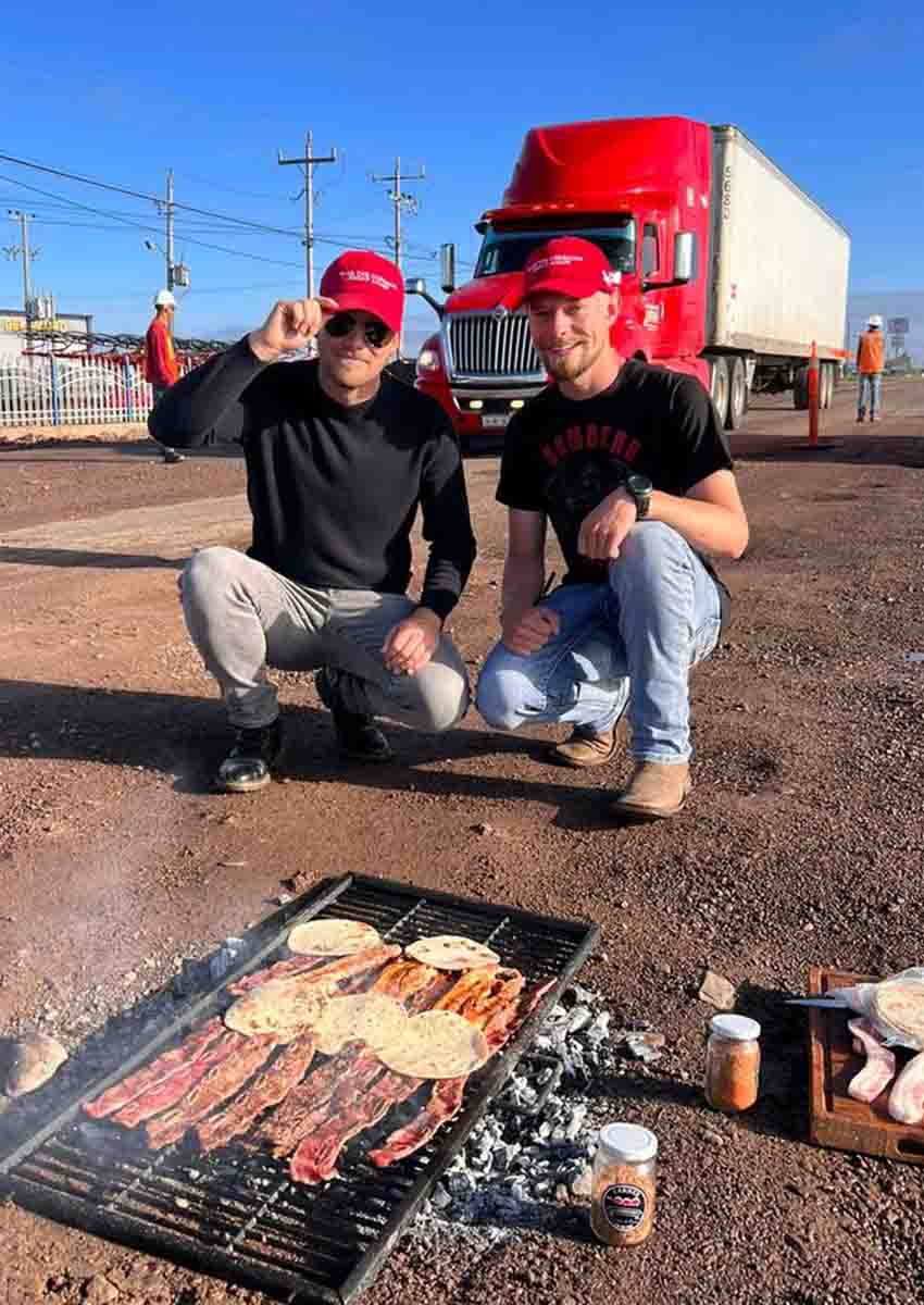 people in Cuauhtemoc, Chihuahua grilling over a pothole