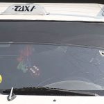 public transit van in Guerrero with bullet holes in windshield