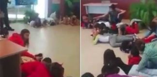 Students take cover on the floor during mock gunbattle