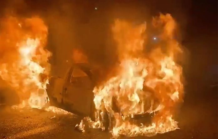A car on fire in Celaya, Guanajuato.