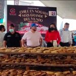 The giant chile en nogada required 2,500 poblano peppers.