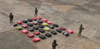 Marines stand guard over Wednesday's cocaine seizure.