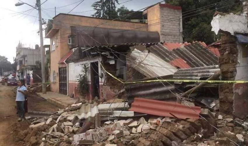 collapsed home from 7.7 earthquake 2022 in Michoacan