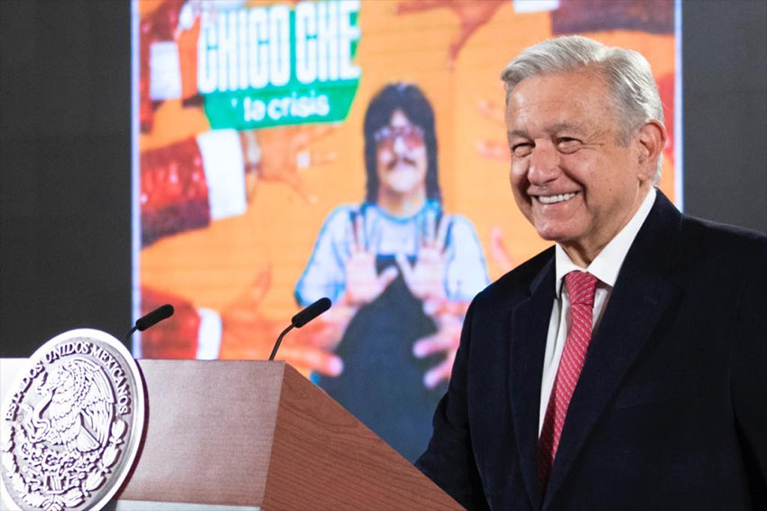 President López Obrador at his morning press conference, with a Chico Che album coverprojected in the background.