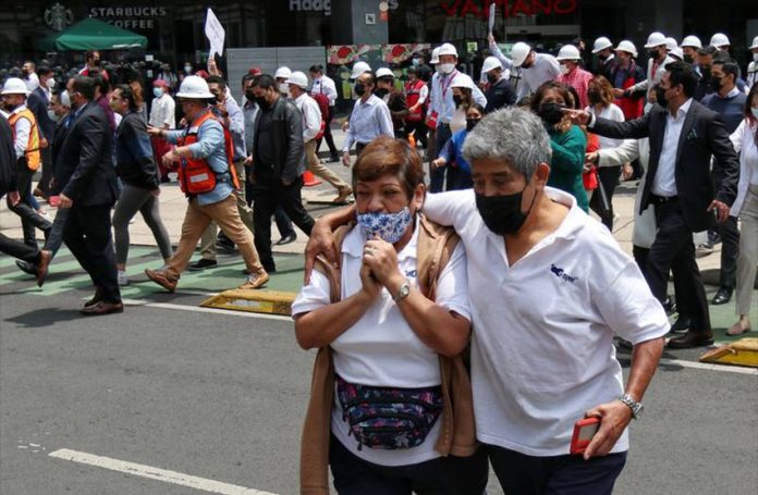 In Mexico City, some residents were already outside their homes and workplaces, thanks to the morning earthquake drill.