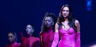 Dua Lipa in concert for her current tour, Future Nostalgia.