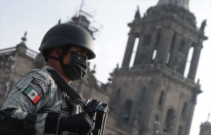 A National Guard member at a 2021 military parade in Mexico City.