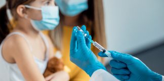 Child receiving vaccination