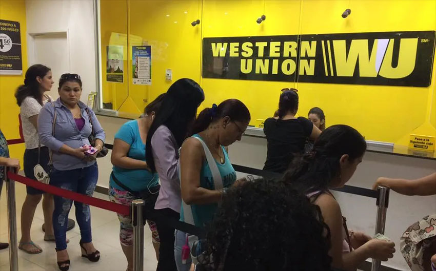 Clients wait in line at Western Union, a popular money transfer service.