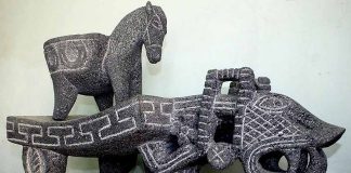 A jaguar metate made of sculpted basalt rock.