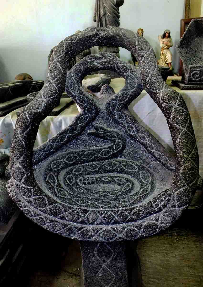basalt sculpted chair made by Jalisco artisan Juan Perez
