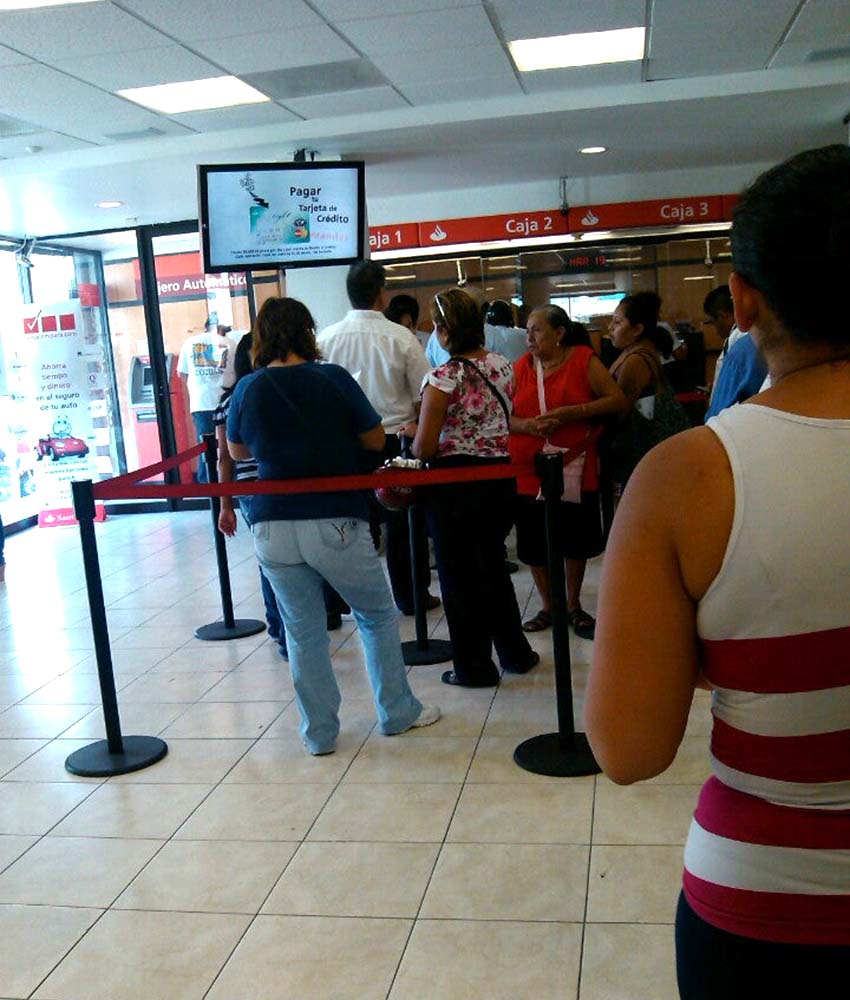 people in a bank in Cozumel