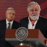 The president looks on as Deputy Interior Minister Alejandro Encinas, head of the Ayotzinapa truth commission, speaks on Thursday.