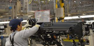 A woman at work in a vehicle manufacturing plant in Guanajuato.