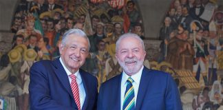 Then-candidate for the Brazilian presidency Luiz Inácio Lula da Silva shakes hands with President López Obrador in March at the National Palace.