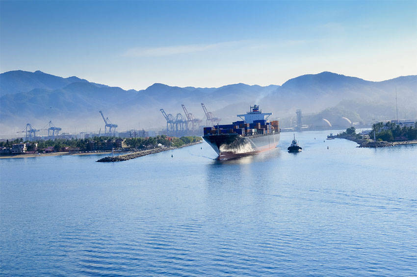 A cargo ship leaves port in Manzanillo, Colima. Strong demand for exports has helped sustain economic growth this year.