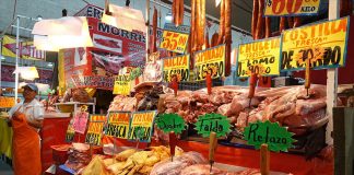 Meat on display for sale at a butcher's stand in a Mexico City market.