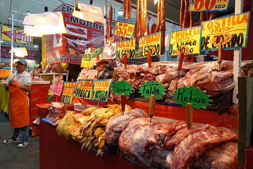 Meat on display for sale at a butcher's stand in a Mexico City market.