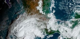Tropical Storm Roslyn approaches the Pacific coast in this satellite photo, taken at 10 a.m. Friday morning.