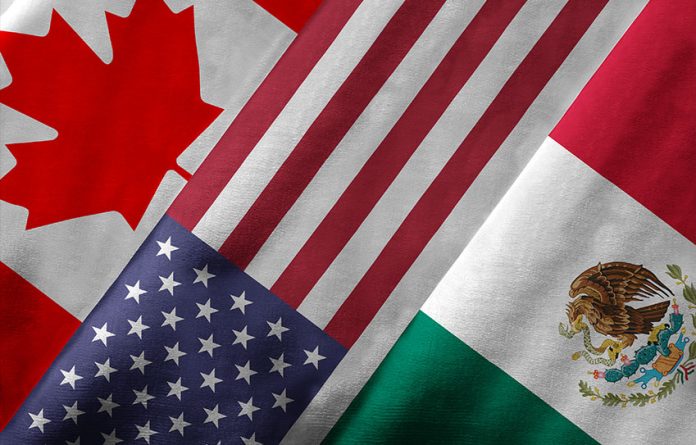 Canadian, U.S. and Mexican flags.