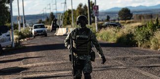 Soldier patrols outside prison in Zacatecas, Mexico