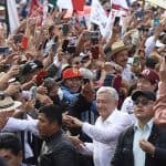 Dense crowds of supporters greet President López Obrador as he arrives at the Zócalo in Mexico City.