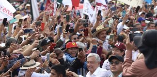 Dense crowds of supporters greet President López Obrador as he arrives at the Zócalo in Mexico City.