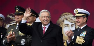 President López Obrador with military leaders at Sunday's Revolution Day ceremony.