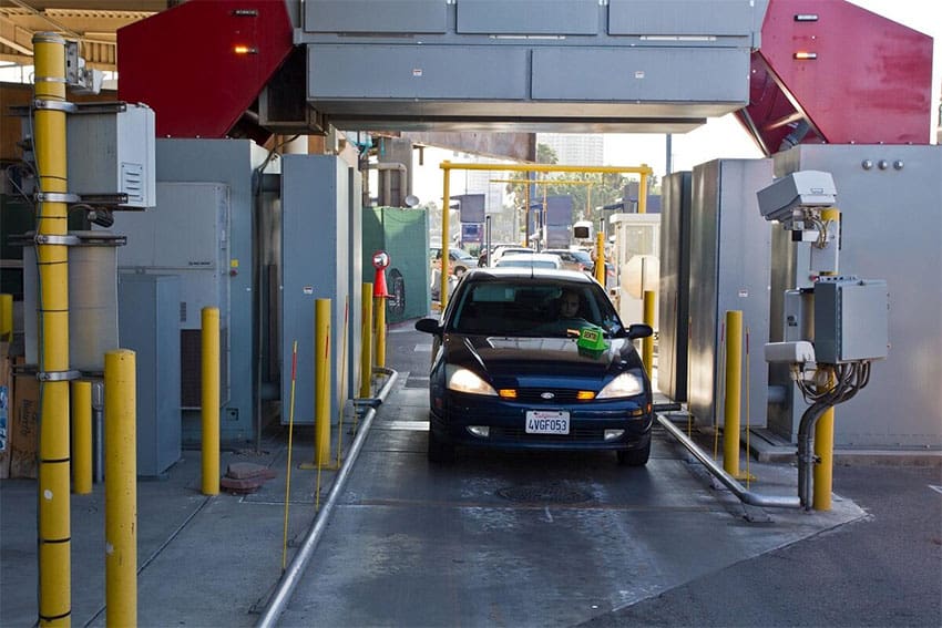 A car passes through a scanner along the U.S. border.