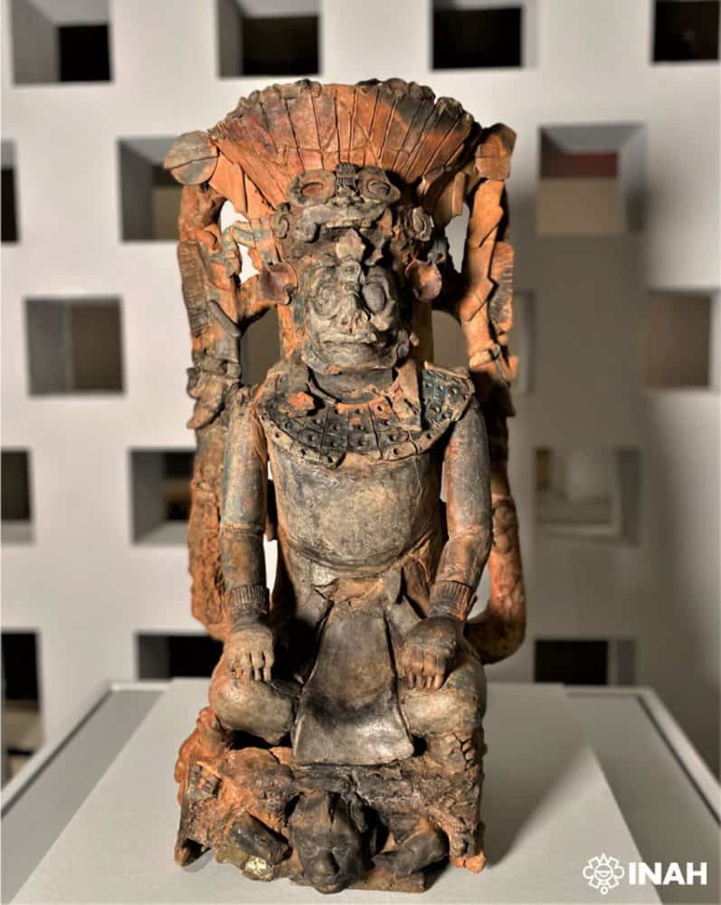 This incense stand, found in the residence of a Palenque royal, depicts a jaguar god wearing a warrior headdress.