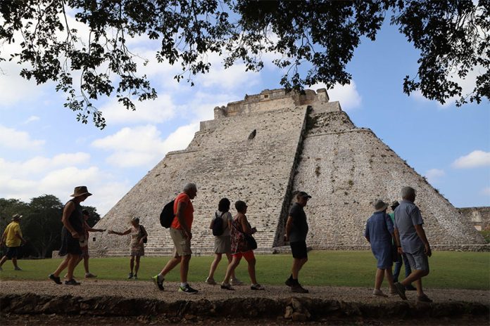 Tourists explore the Uxmal archaeological area in Yucatán, in early December.