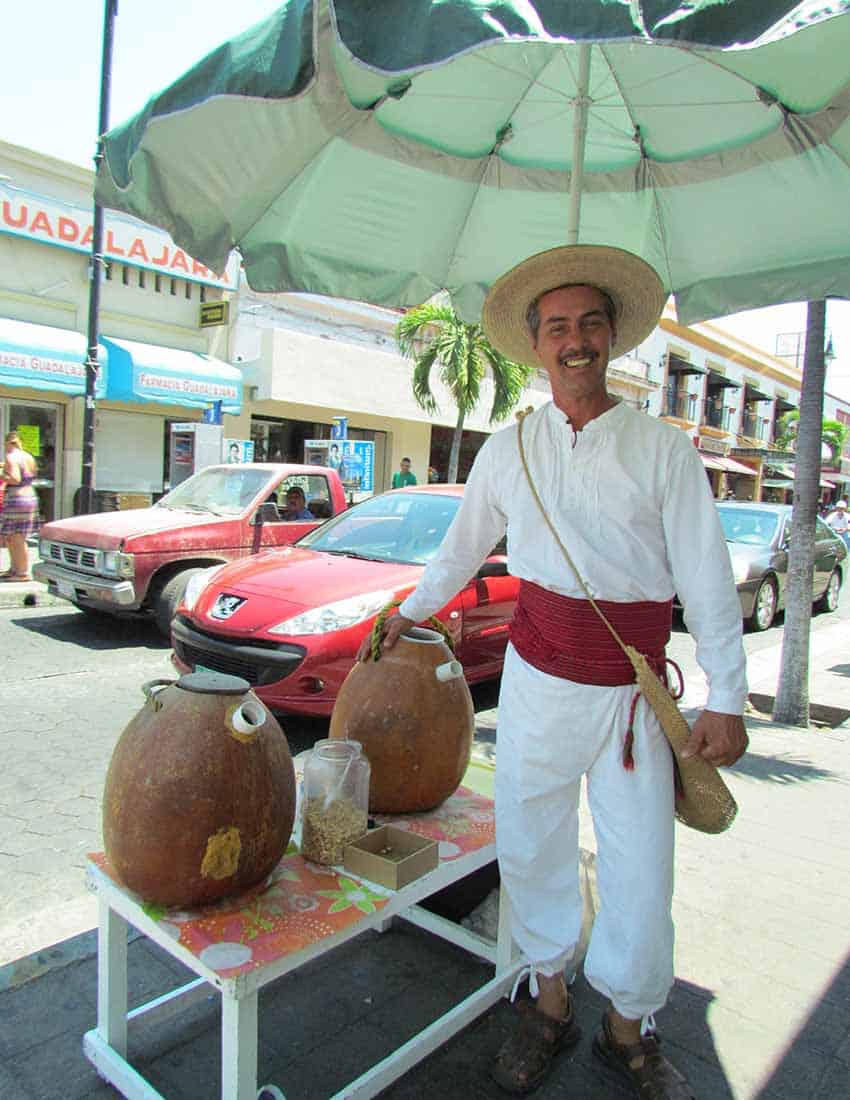 Hugo Fierro, a vendor in Colima city, Mexico, selling the drink tuba in 2013