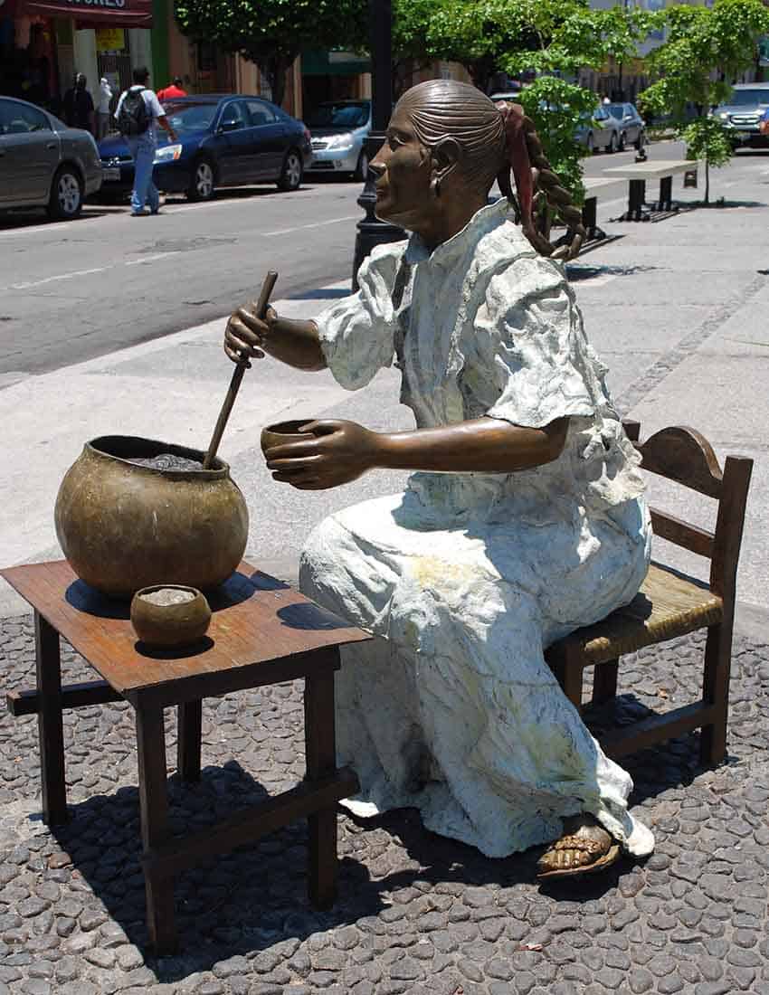 statue of tuba drink seller in Colima city.