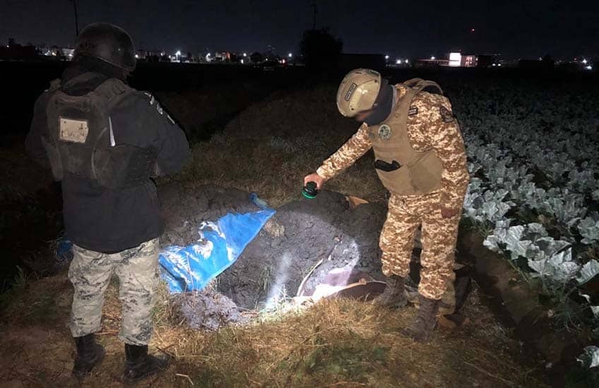 Mexico's National Guardsmen searching for illegal fuel pipeline taps underground.