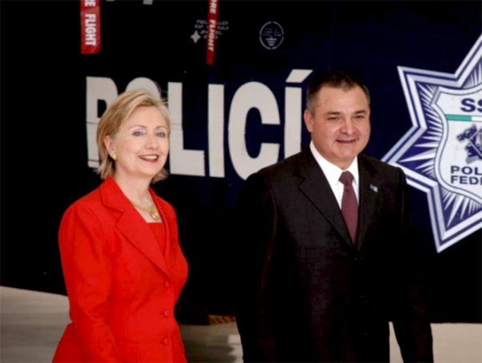 Hilary Clinton and former Mexico Security Minister Genaro Garcia Luna