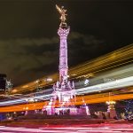 A time-lapse photo of Mexico City's Angel of Independence statue at night.