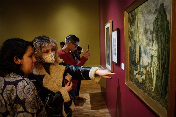 Visitors at a recent exhibition of works by Mexican painter Remedios Varo, at the Mexico City Museum of Modern Art, part of the National Institute of Fine Arts and Literature (INBAL).